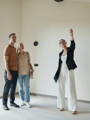 Agent giving a tour of an apartment.